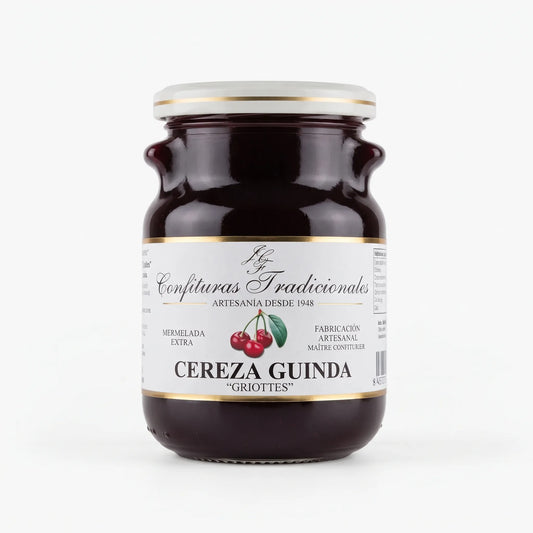 Frasco transparente de confitura tradicional de cereza guinda con etiqueta blanca, dejando ver la mermelada y mostrando la ilustración de cerezas junto a la marca.