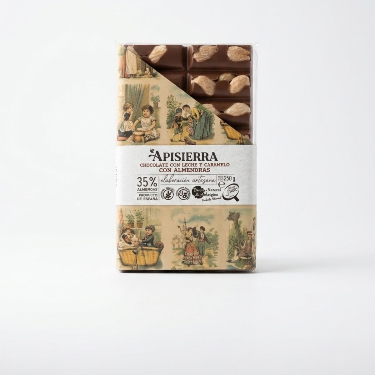 Tabletón de chocolate con almendras enteras tostadas a mano realizado de forma artesanal. El diseño nos permite ver un poco la tableta y la otra mitad con un diseño clásico pero muy elegante.