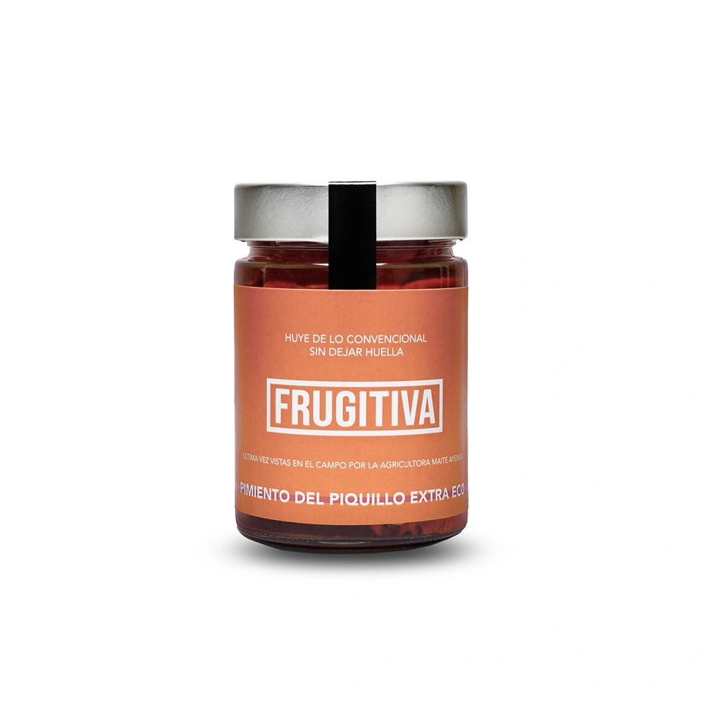 Tarro de pimientos del piquillo extra ecológicos Frugitiva sobre fondo blanco con etiqueta de color anaranjado, el nombre de la marca en el centro en tipografía blanca y la descripción del producto alrededor.