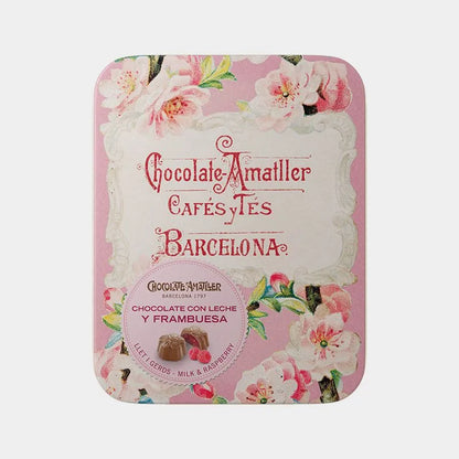 Lata vintage rellena de bombones de chocolate con leche y corazón de frambuesa en D'12 Gourmet.