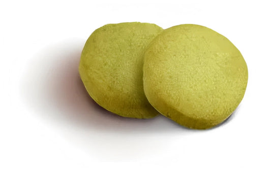 Dos galletas redondas de mantequilla con crema de pistacho de Lady Joseph.