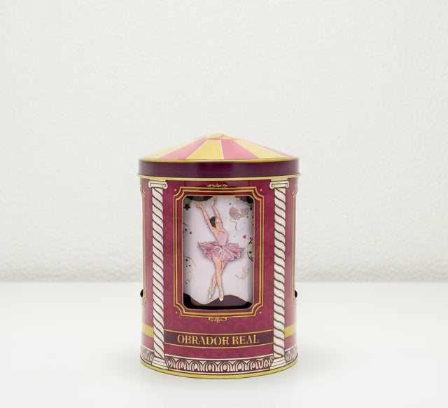 elegante lata rosa carrusel musical con diseño de bailarina