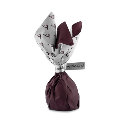 Un único bombón de higo para ver como se encuentran envuelto se su papel, de forma individual.