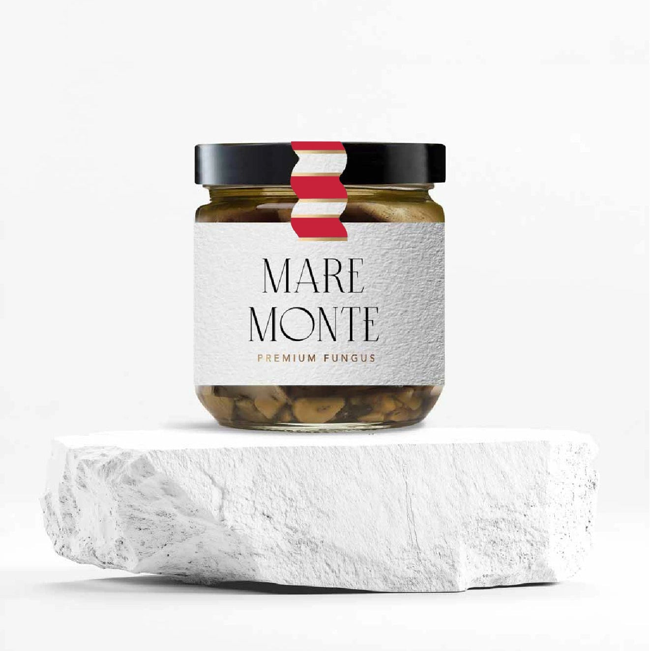 Bote de Shitake ECO en vinagret, sobre piedra blanca y fondo blanco